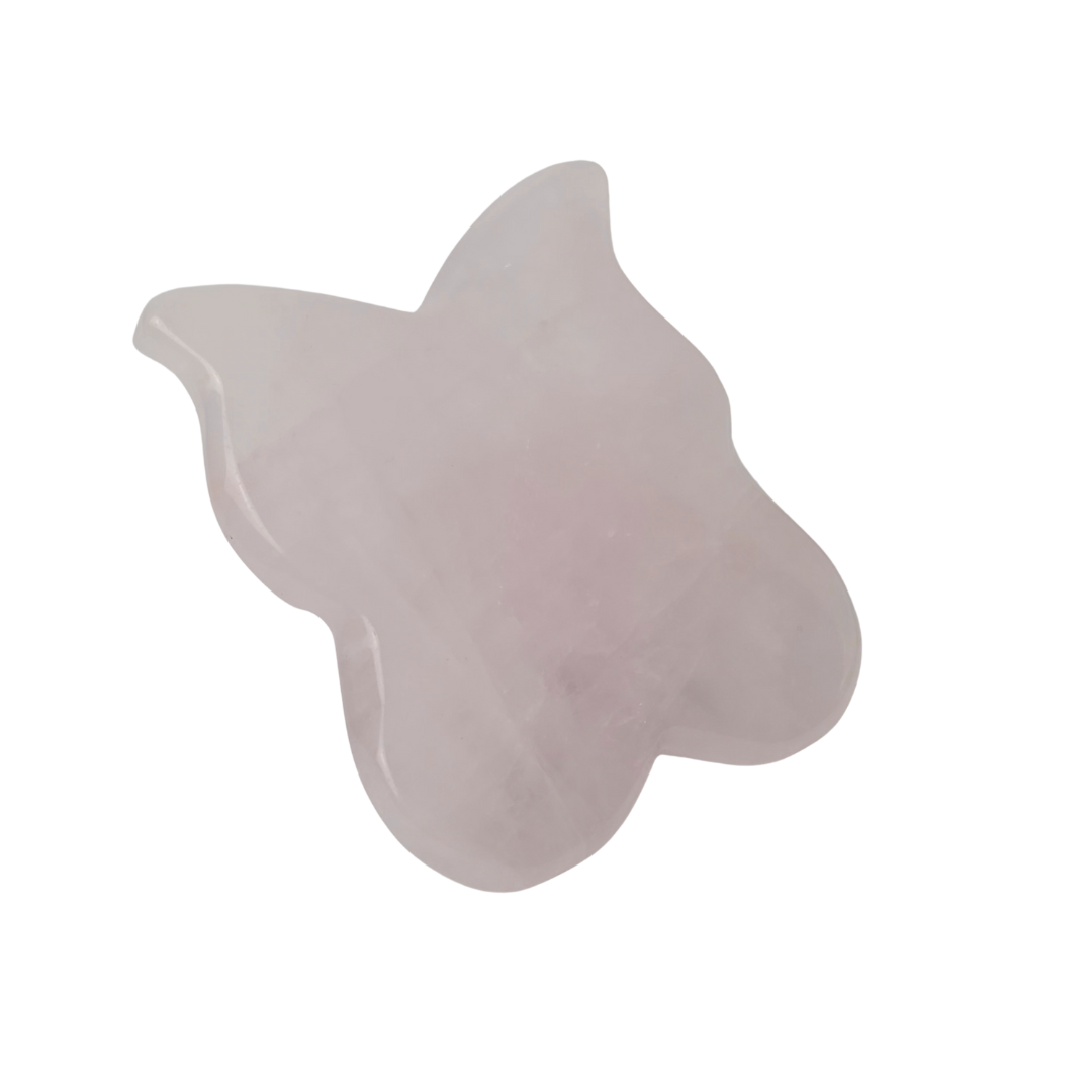 The pink stone butterfly tool lying at an angle