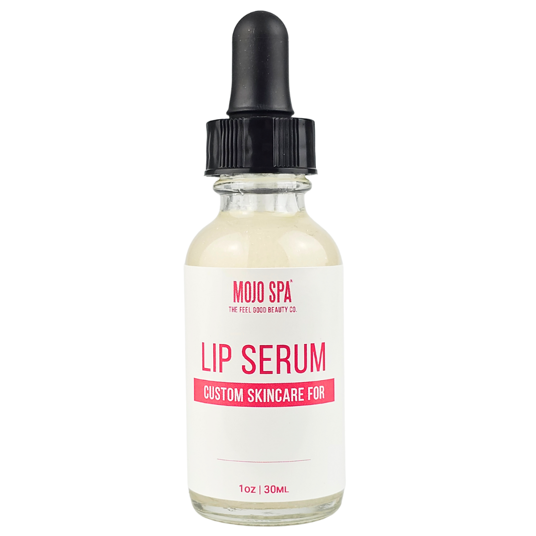 Custom lip serum in a 1 oz glass dropper bottle with a black bulb, its label with space for a name