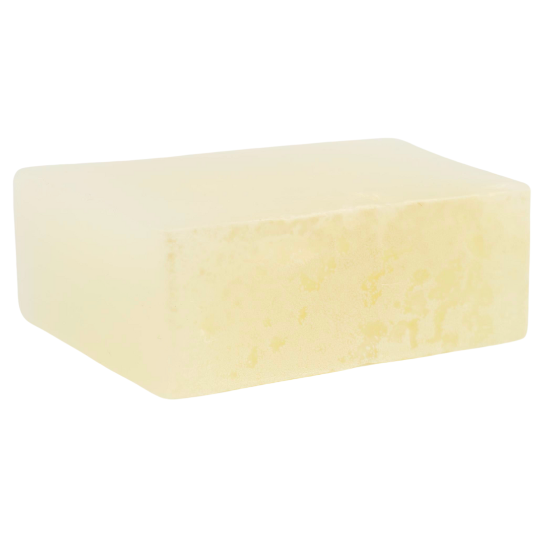 The unwrapped bar from the side, showing its speckled, textured cut edge