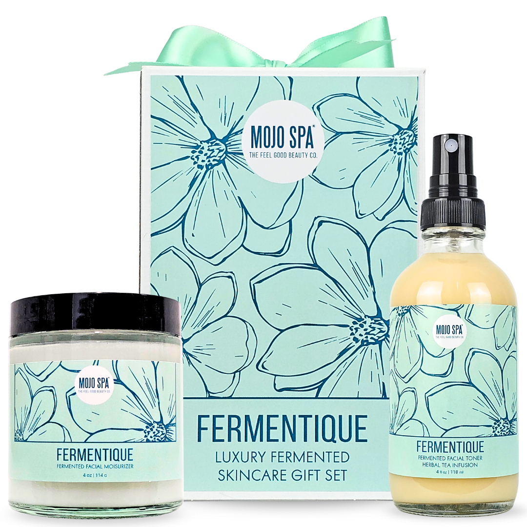 Fermentique skincare gift set, a mint-ribboned box with a moisturizer jar and a toner spray bottle