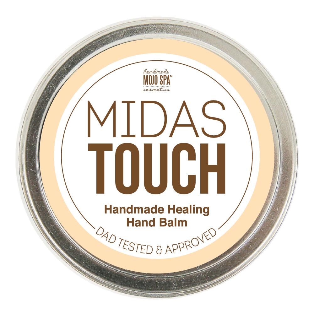 The round silver tin of Midas Touch hand balm from above, its label reading Dad Tested & Approved