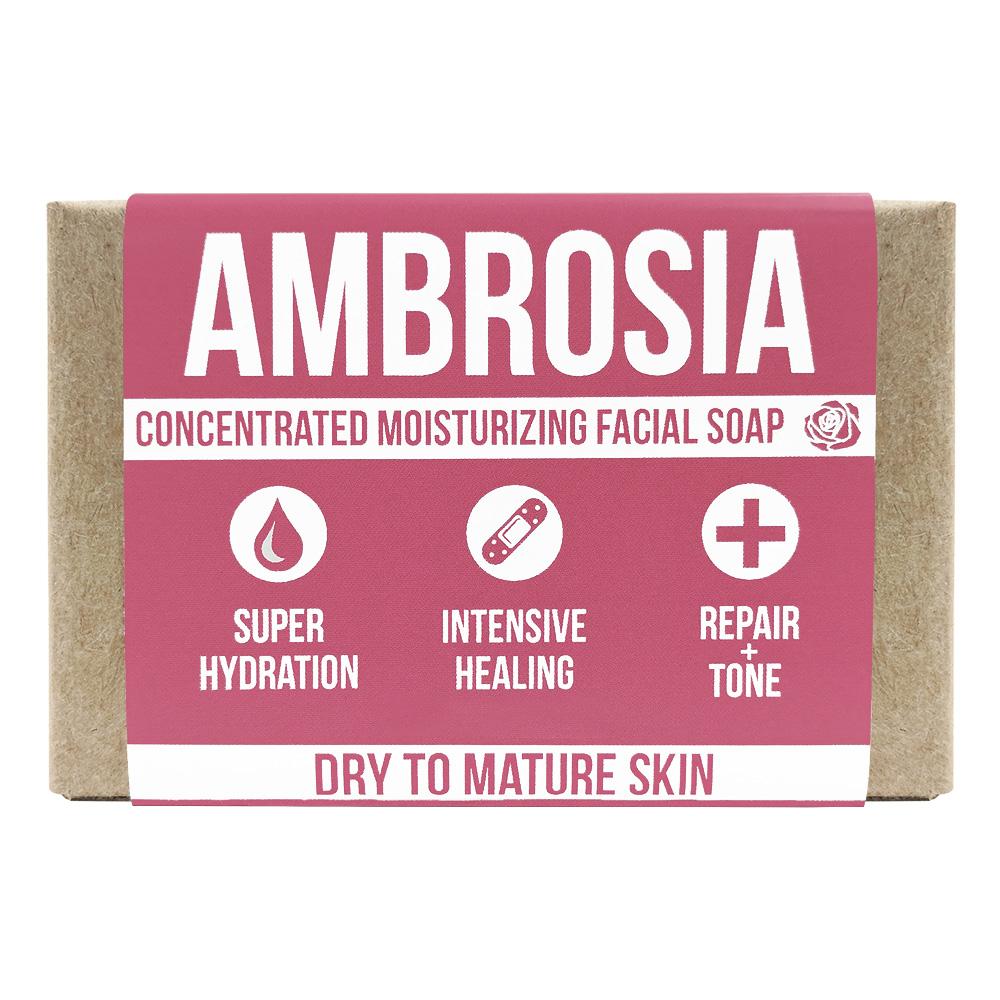 Ambrosia moisturizing facial soap, a bar in kraft paper with a rose-pink wrap label and three icons
