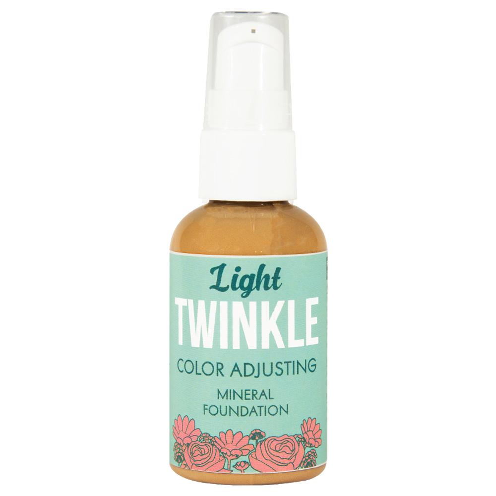 Light Twinkle color adjusting mineral makeup in a bottle with a white pump and a mint green floral label