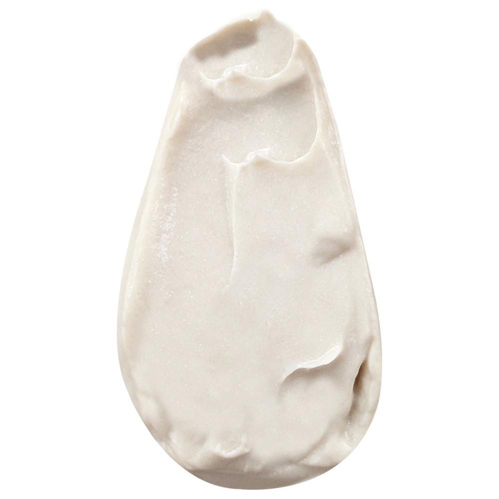 The cream smeared out, smooth ivory with a faint shimmer