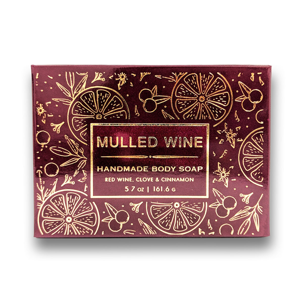 The soap carton on its own, burgundy and gold with a label reading Handmade Body Soap, Red Wine, Clove and Cinnamon