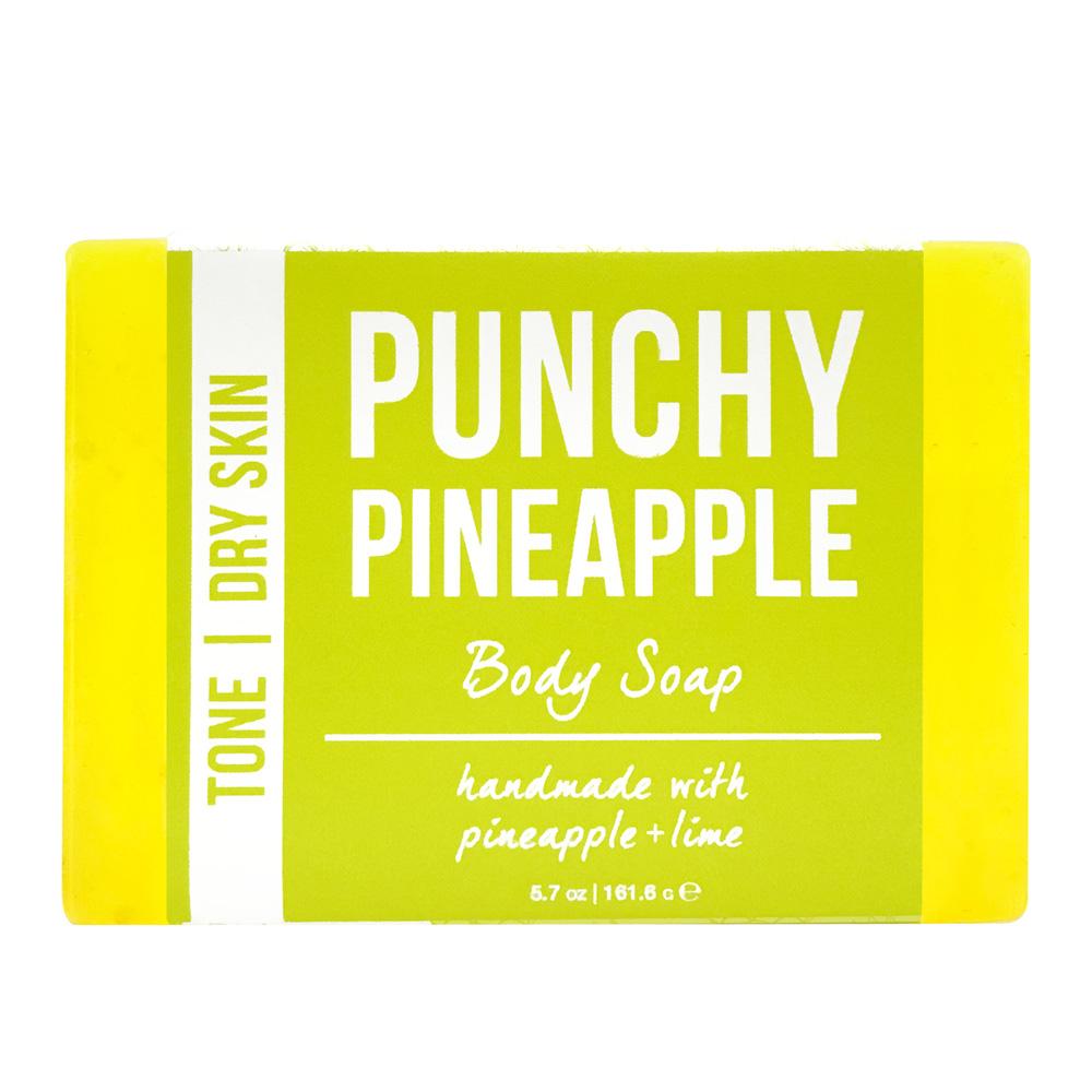 Punchy Pineapple body soap, a bright yellow-green 5.7 oz bar with a green wrap label reading handmade with pineapple and lime