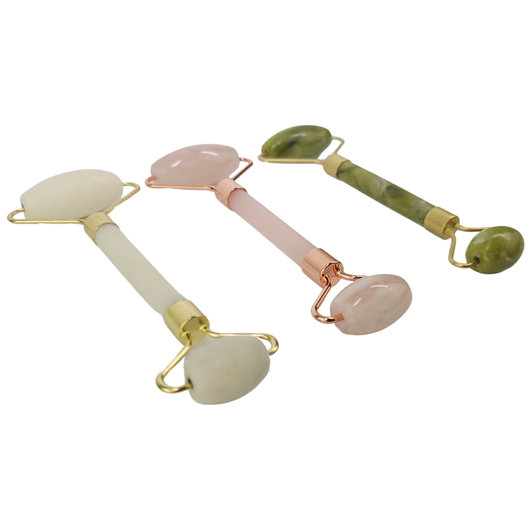 The three rollers laid at an angle, white, pink and green