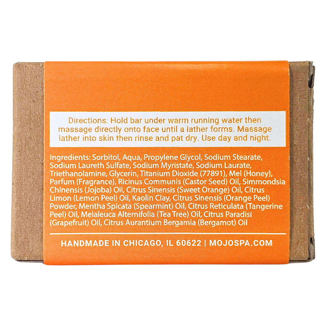 The back of the box, its orange label with directions, the ingredients list and Handmade in Chicago
