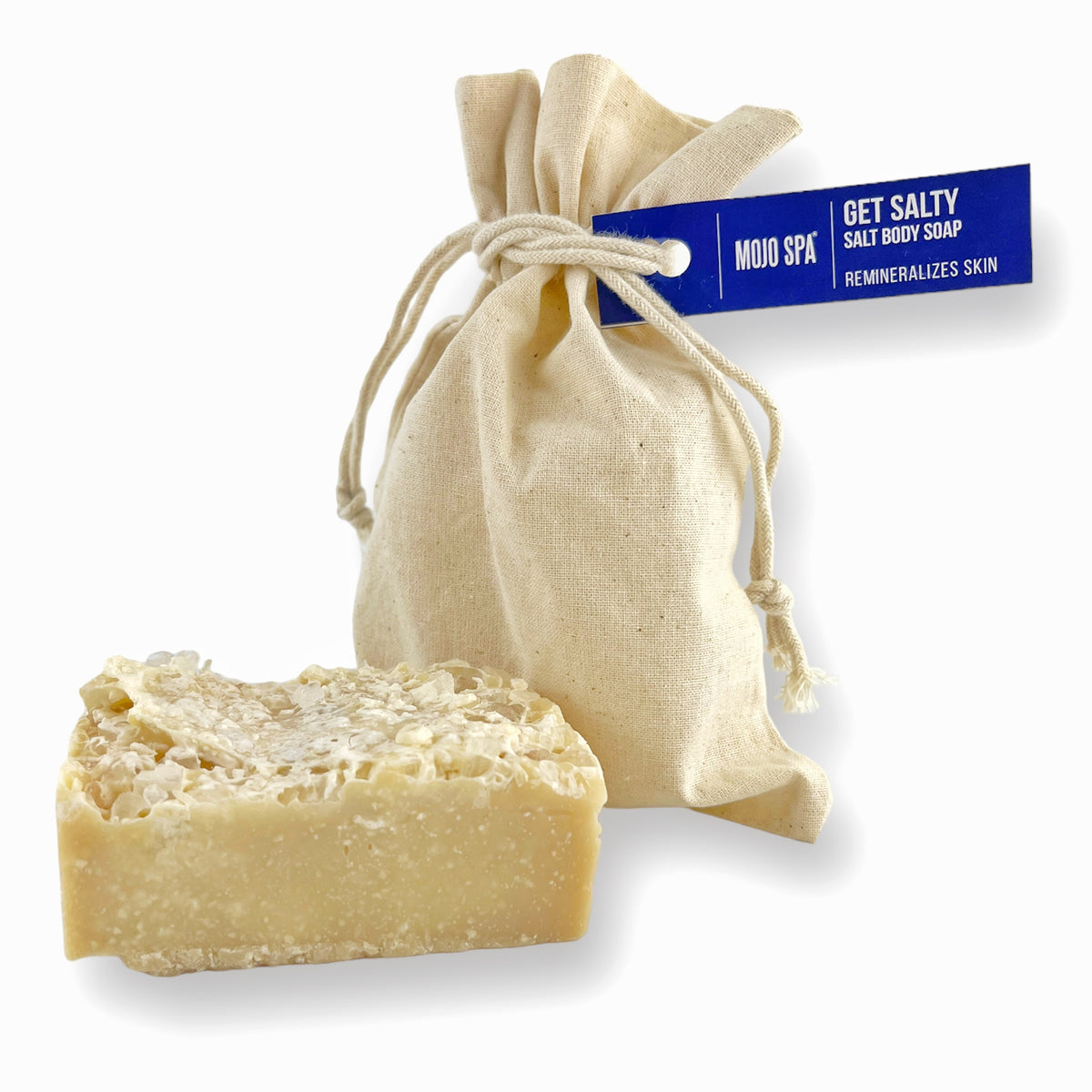 The bar lying flat in front of the bag, salt crystals on its top