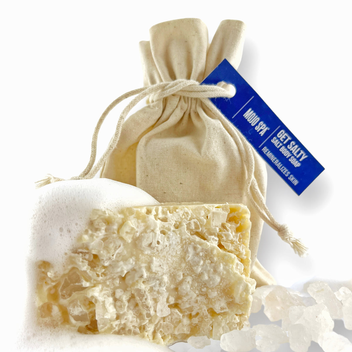 A closer view of the bar among soap suds and salt crystals