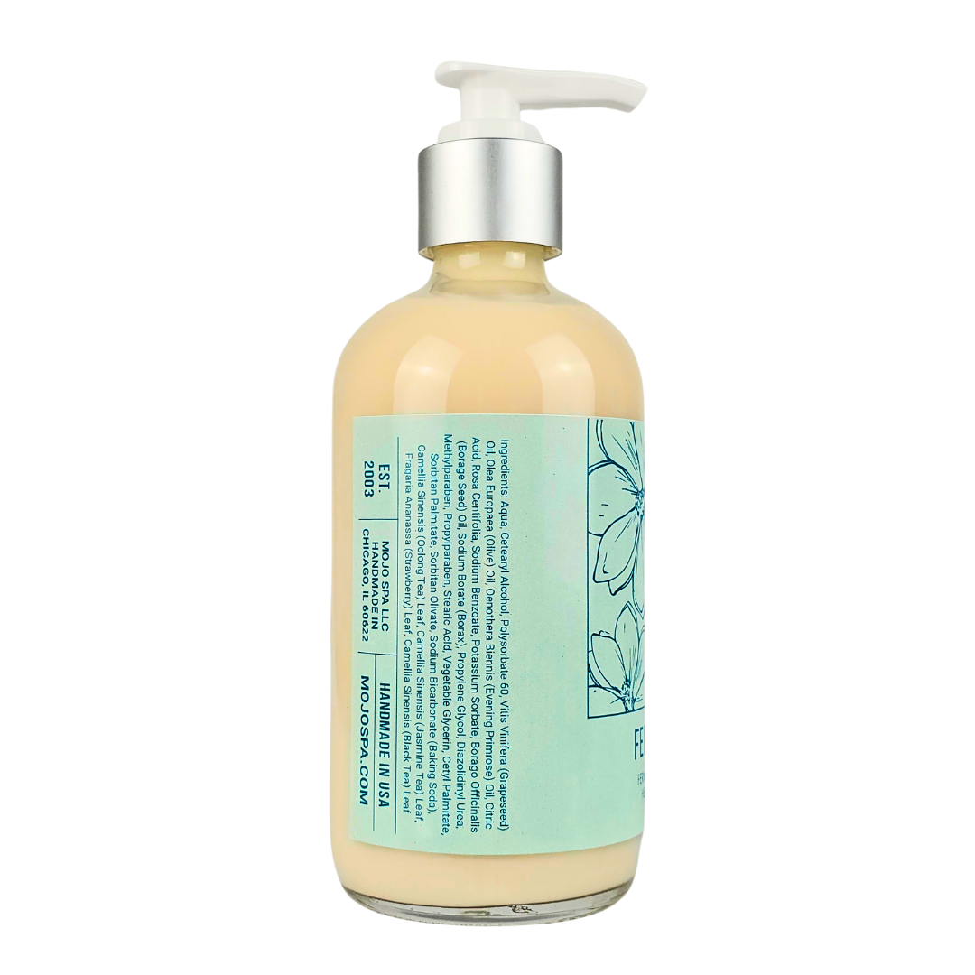 The side of the bottle, its label showing the ingredients list and Handmade in USA