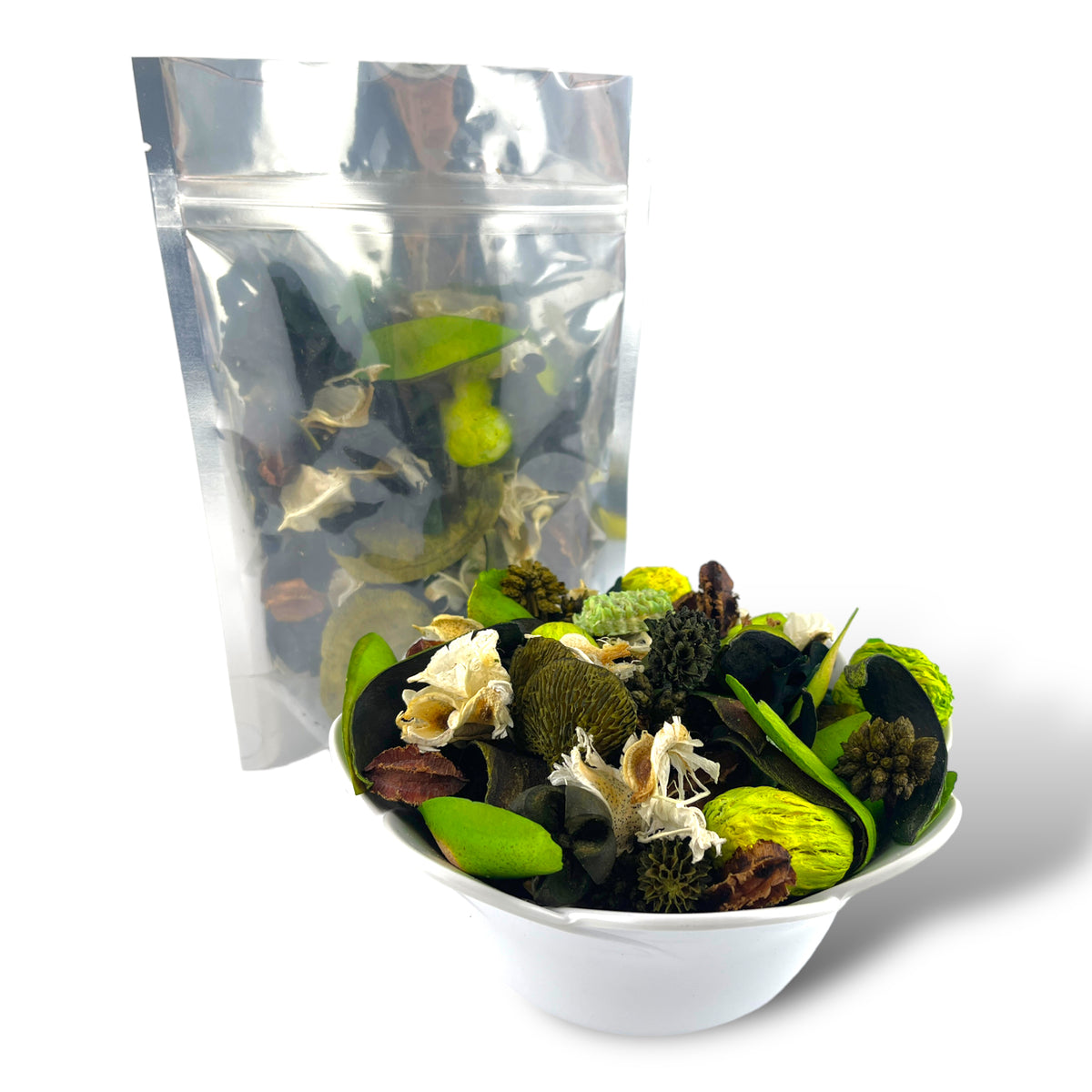 A silver-backed pouch of potpourri behind a white bowl of the mix