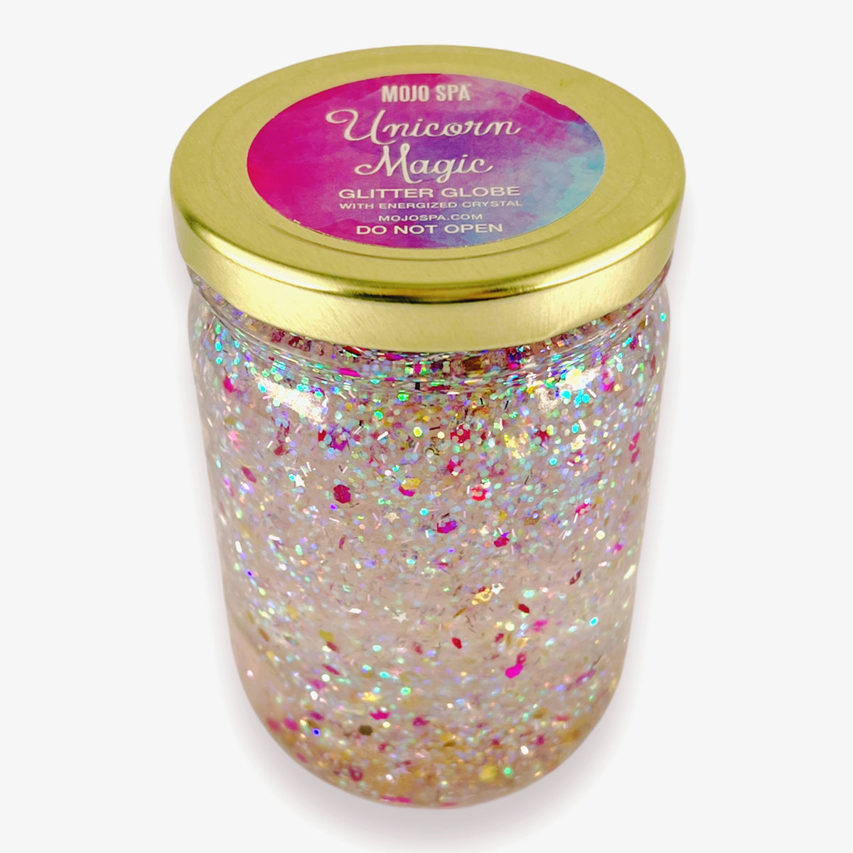 A Unicorn Magic glitter globe, a glass jar of multicolored glitter with a gold lid