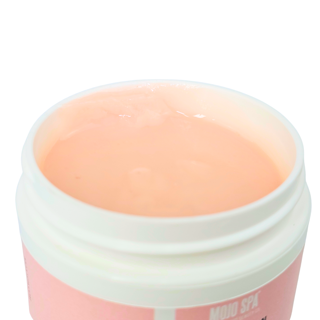The open jar, showing the smooth peach gel