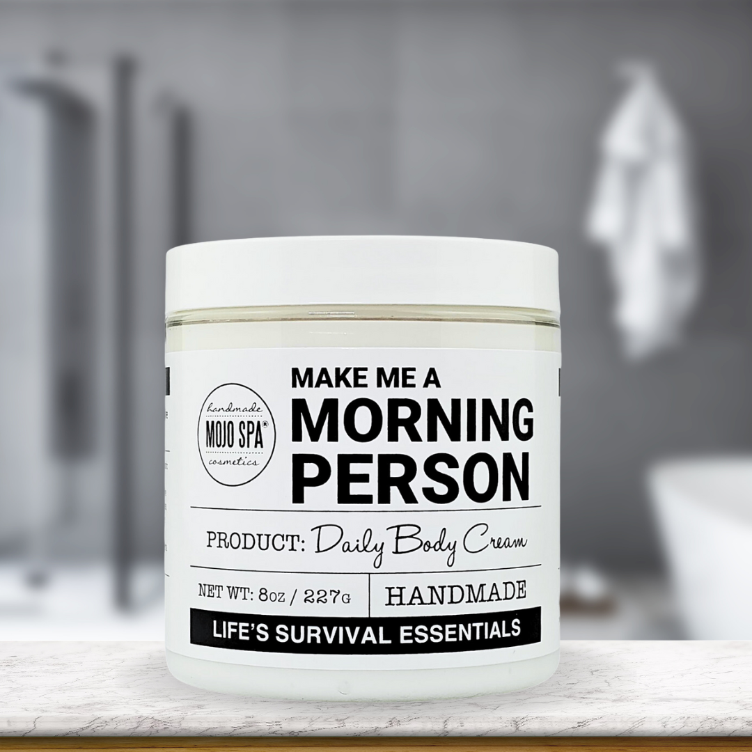 The jar on a marble shelf in a bathroom, a white towel hanging behind