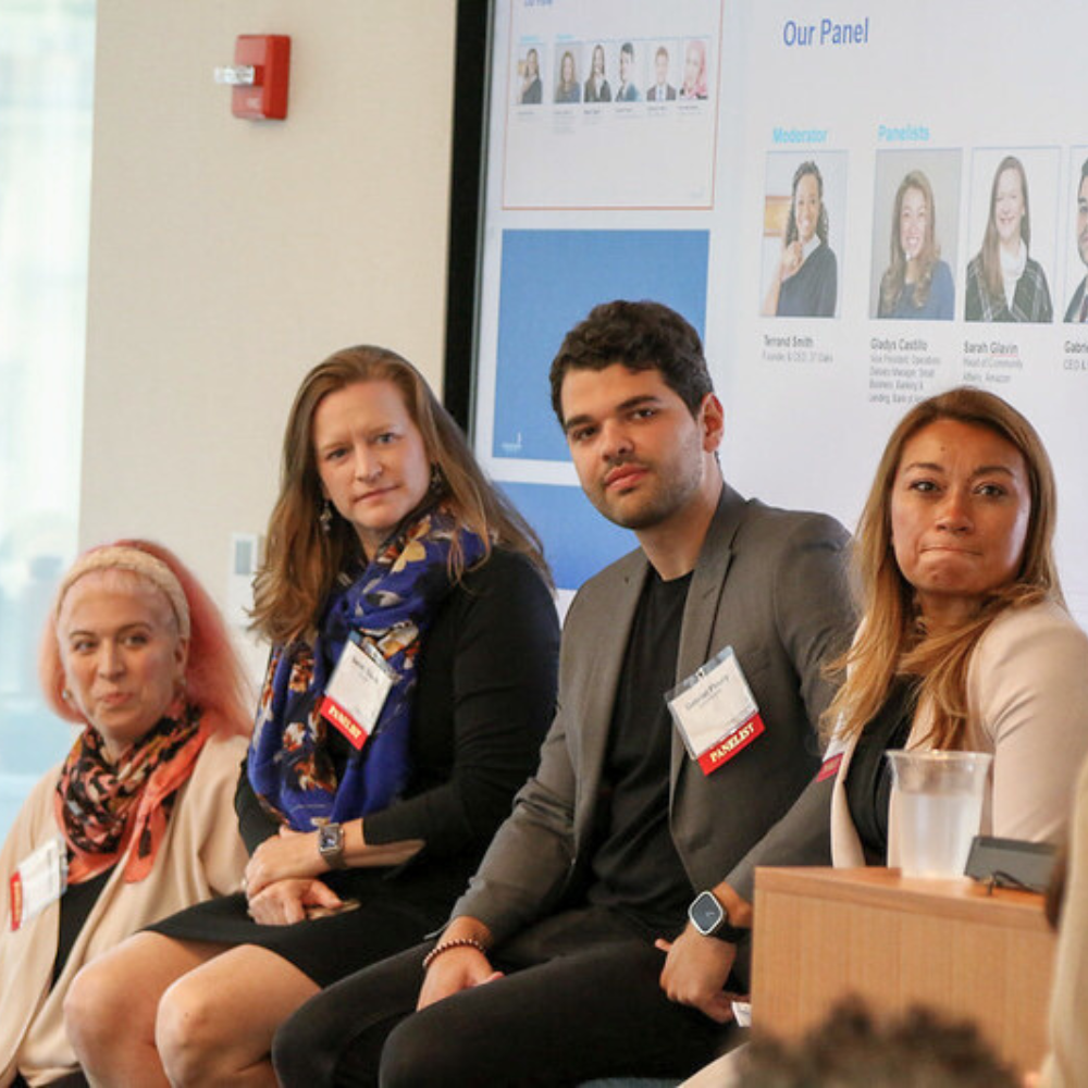 Amanda speaking on a small business panel with three other panelists