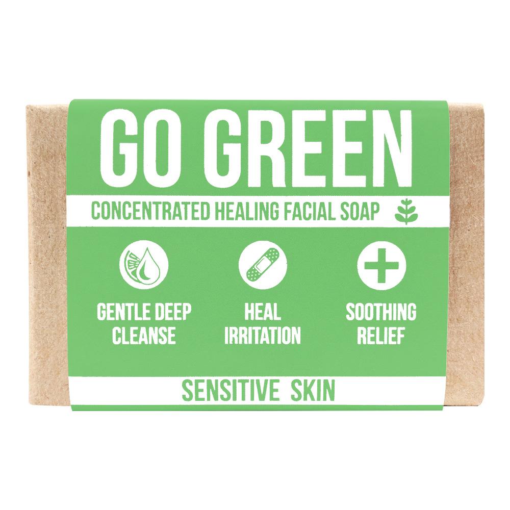Go Green facial soap, a bar with a green wrap label, three icons and the words sensitive skin over a brown paper band