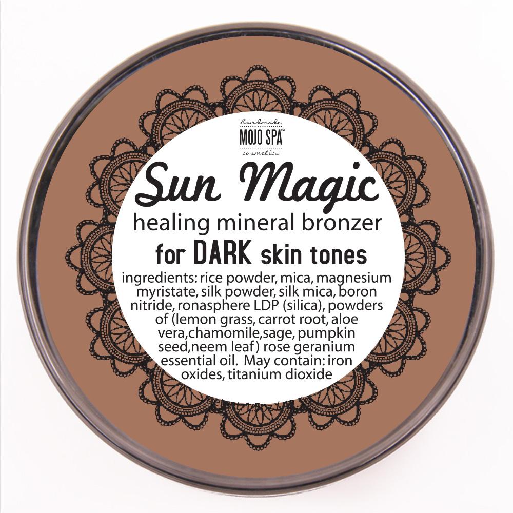 The lid label with the Mojo Spa logo, for dark skin tones, and the full ingredients list inside a black lace-style border
