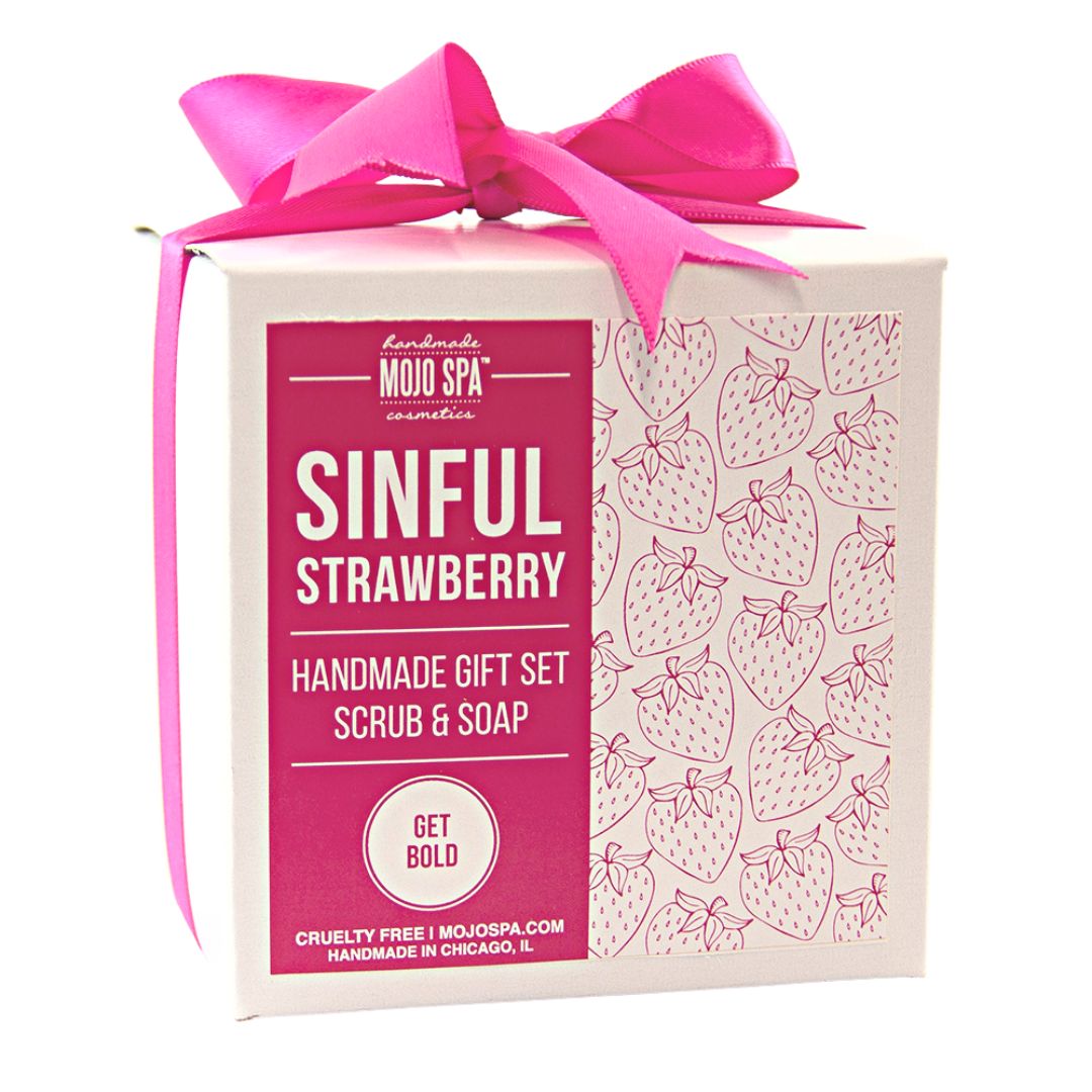 The gift box from a slight angle, showing the pink bow on top and the Get Bold seal on the label