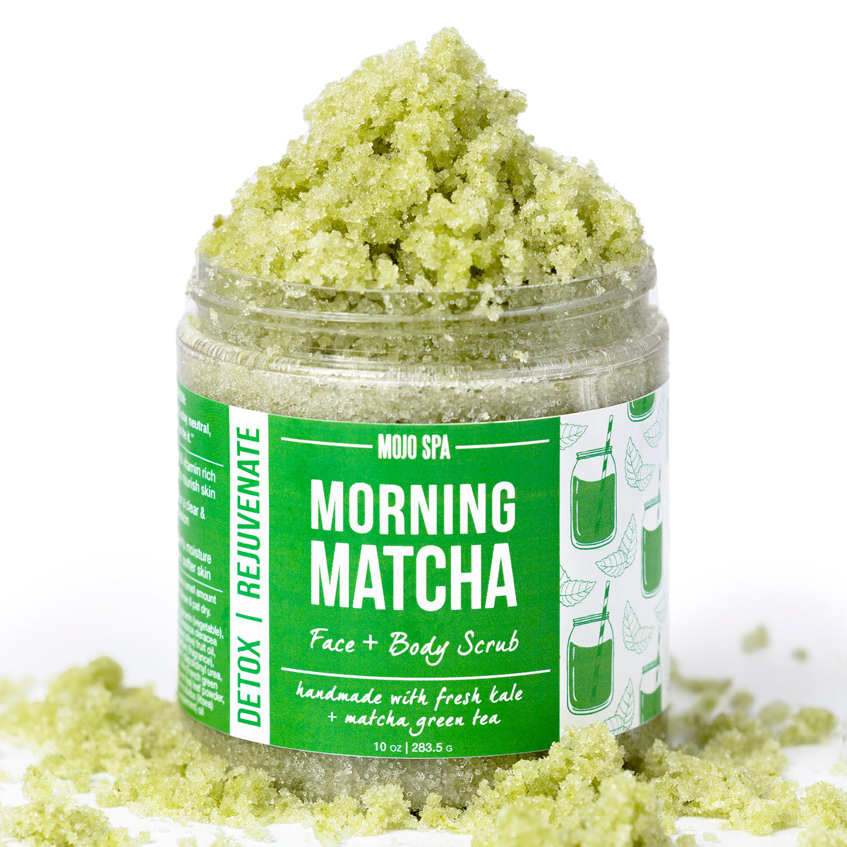 The jar with scrub piled high and loose green scrub scattered around its base