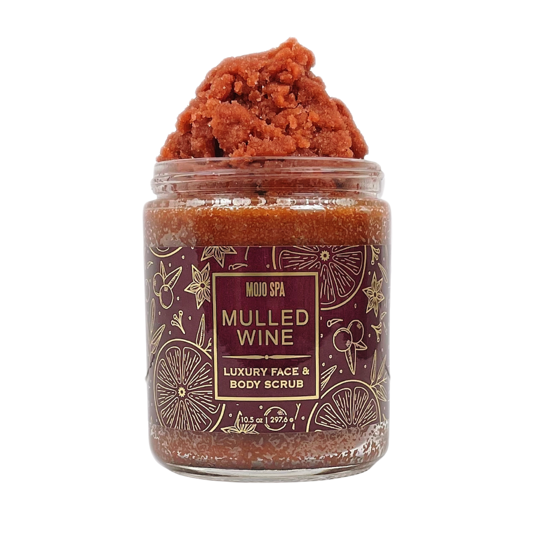 The face and body scrub jar on its own, orange-brown sugar scrub piled above the rim